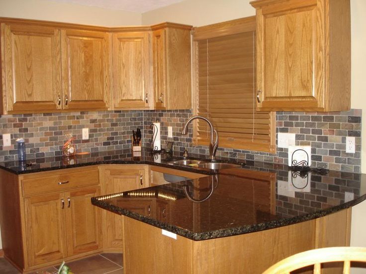 Home Decor Inspiration : honey oak kitchen cabinets with black